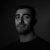 monochrome-portrait-of-a-man-with-dark-hair-2026-01-06-10-00-55-utc_optimized_200.jpg